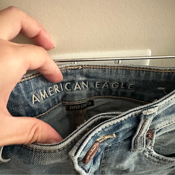 AE Light Wash Distressed High Rise Shortie Eyelet Pockets Denim Shorts - Picture 3 of 9